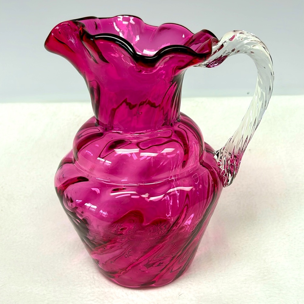 Vintage 9” hand blown swirl pattern cranberry glass pitcher